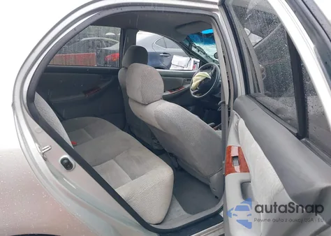 2004 Toyota Corolla Le z USA, uszkodzony, nr VIN 2T1BR32E44C299304